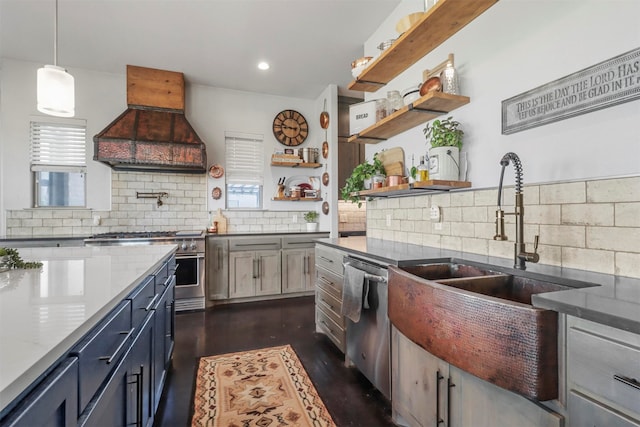 kitchen with custom range hood, dark wood-type flooring, tasteful backsplash, gray cabinetry, and stainless steel appliances