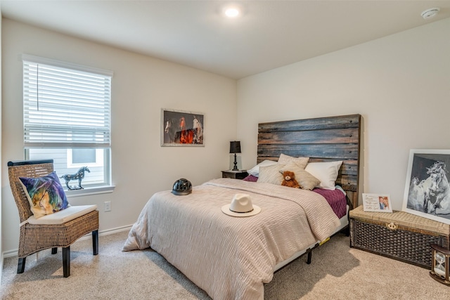 bedroom with light carpet