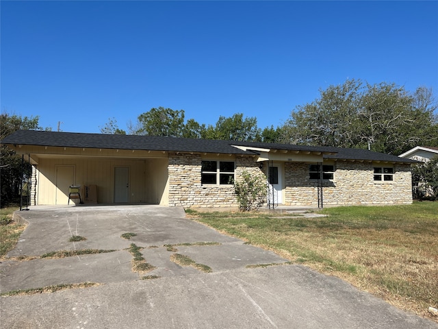 ranch-style house with a front lawn