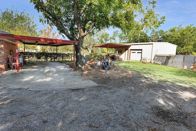 view of yard with an outdoor structure