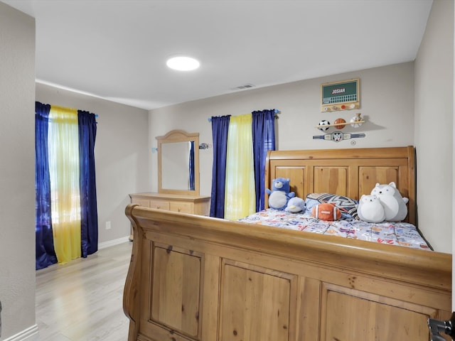 bedroom featuring light hardwood / wood-style floors