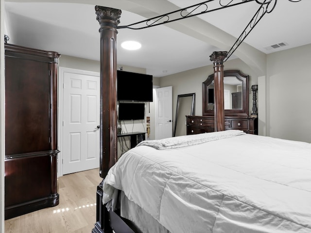 bedroom with light wood-type flooring