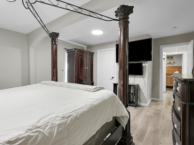 bedroom with light wood-type flooring