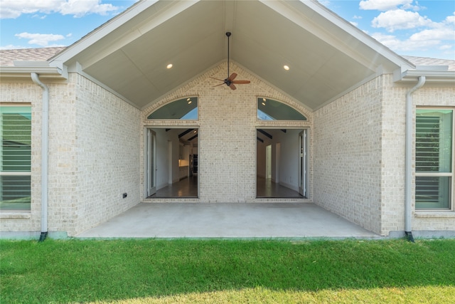 exterior space with a yard, a patio, and ceiling fan