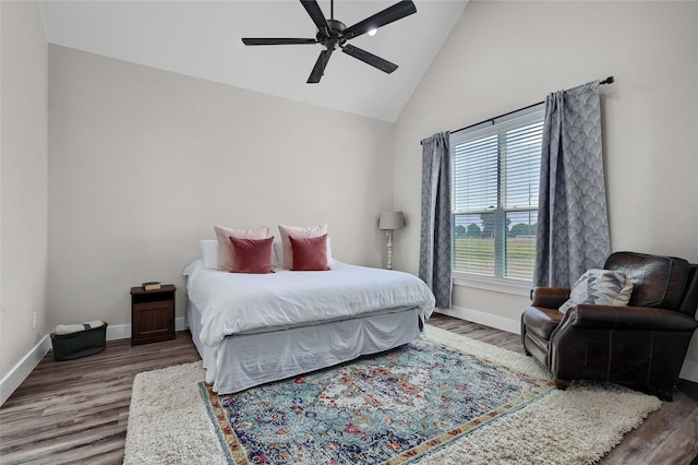 bedroom featuring high vaulted ceiling, wood finished floors, a ceiling fan, and baseboards