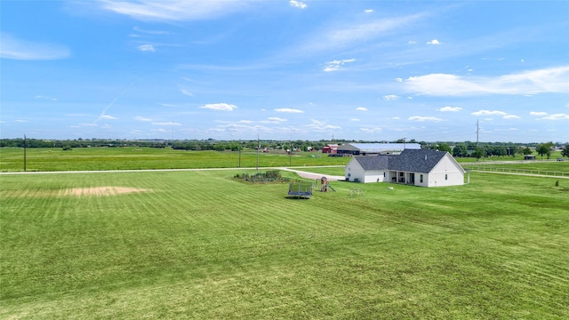 birds eye view of property featuring a rural view