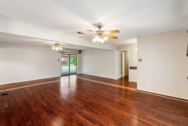 unfurnished room featuring a ceiling fan, a textured ceiling, baseboards, and wood finished floors