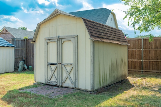 view of shed featuring a fenced backyard