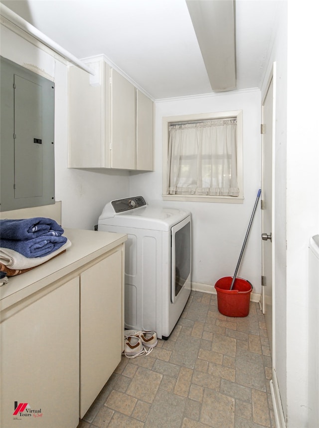 laundry area with cabinets, separate washer and dryer, and electric panel