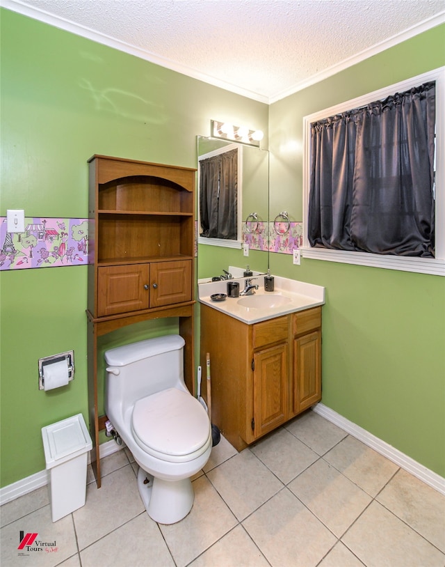 bathroom featuring a textured ceiling, tile patterned flooring, vanity, and toilet