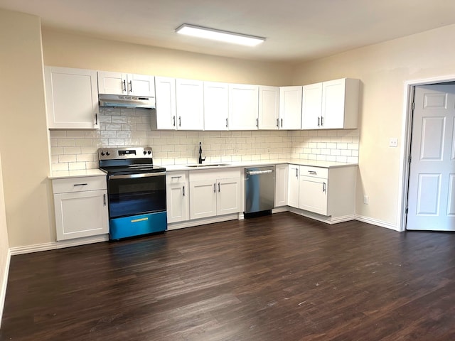 kitchen with sink, dark hardwood / wood-style flooring, stainless steel appliances, and white cabinets