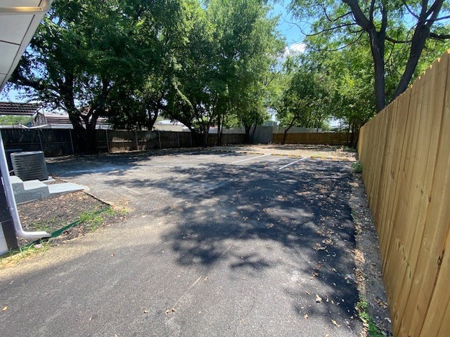 view of yard with central AC unit