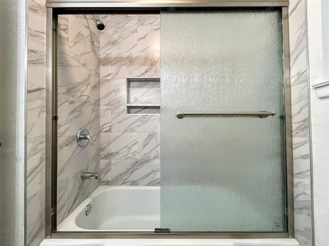 bathroom featuring enclosed tub / shower combo