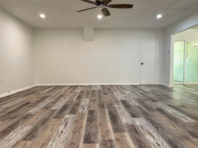 unfurnished room with ceiling fan and dark hardwood / wood-style flooring