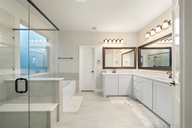 bathroom featuring plus walk in shower and vanity