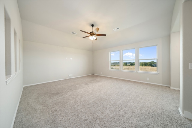 empty room with light carpet and ceiling fan