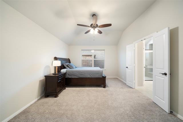 carpeted bedroom with lofted ceiling and ceiling fan