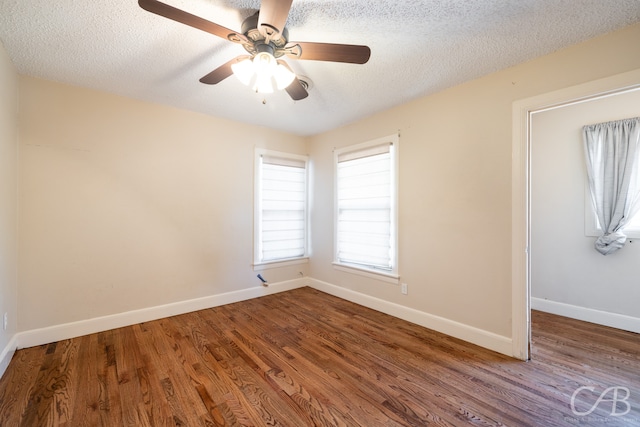 unfurnished room featuring hardwood / wood-style flooring, a textured ceiling, and ceiling fan