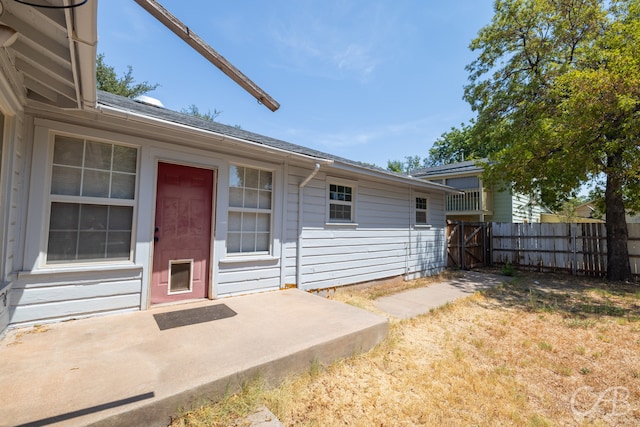 entrance to property with a patio area