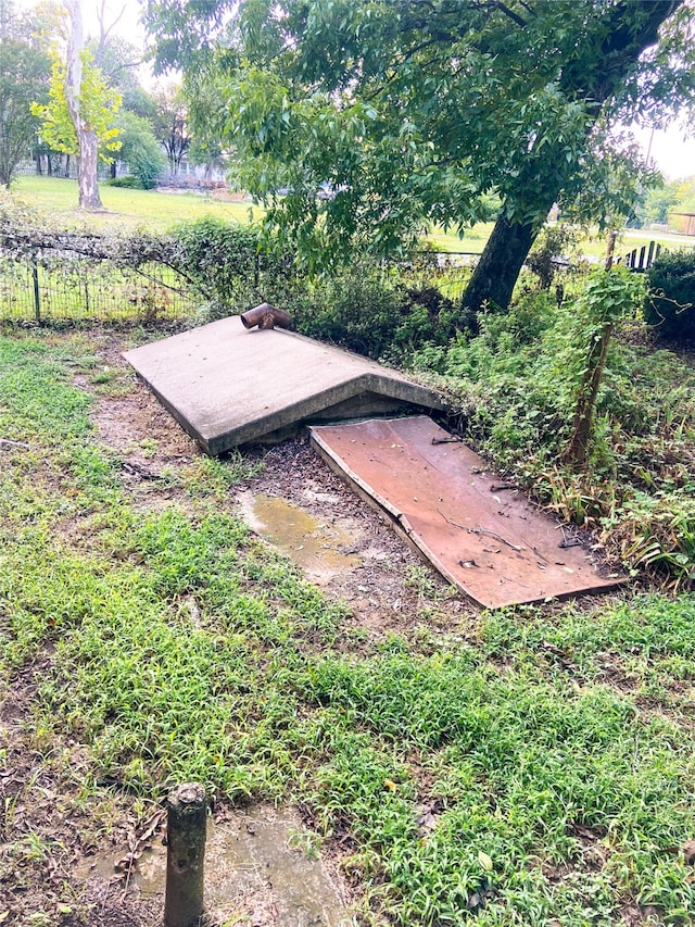 view of entry to storm shelter