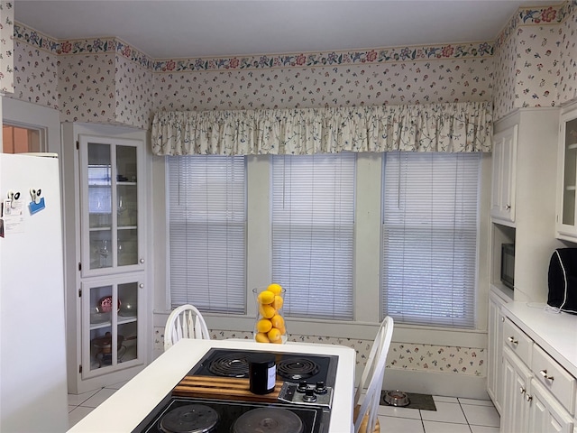 dining room featuring light tile patterned floors