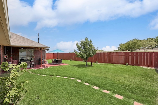 view of yard with a patio area