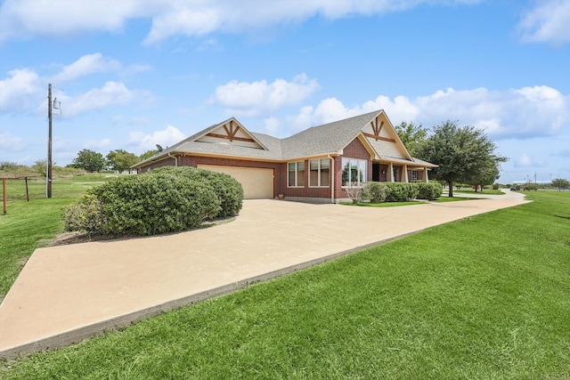 craftsman inspired home with a garage and a front lawn