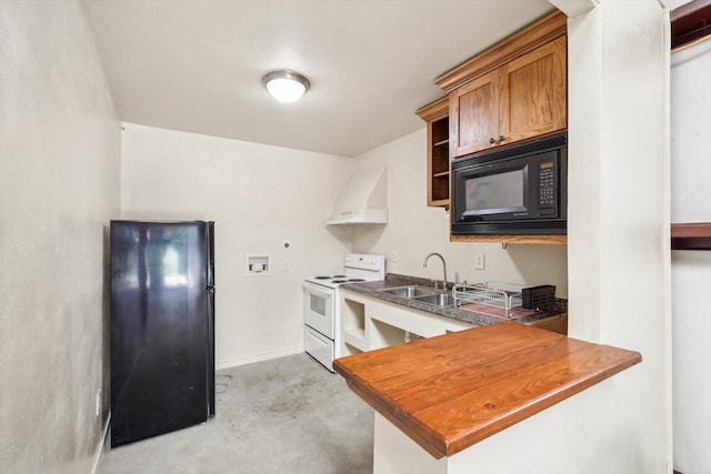 kitchen featuring sink, premium range hood, and black appliances