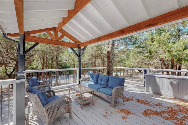 deck featuring outdoor lounge area