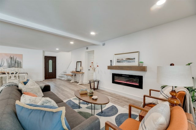 living room with light hardwood / wood-style floors