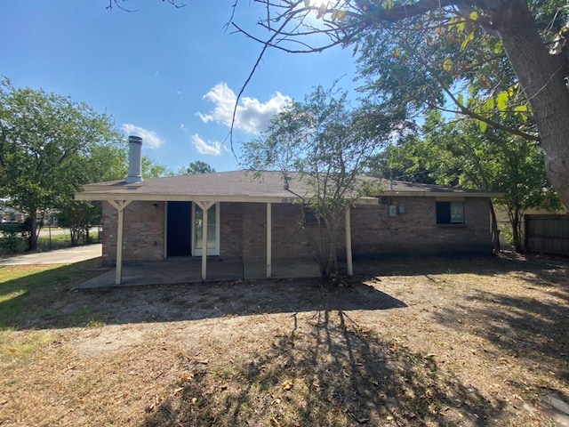 back of house with a patio area