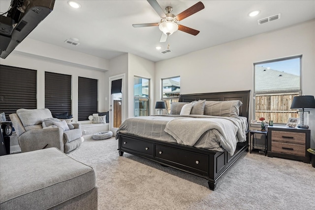 carpeted bedroom with ceiling fan