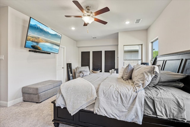 carpeted bedroom featuring ceiling fan