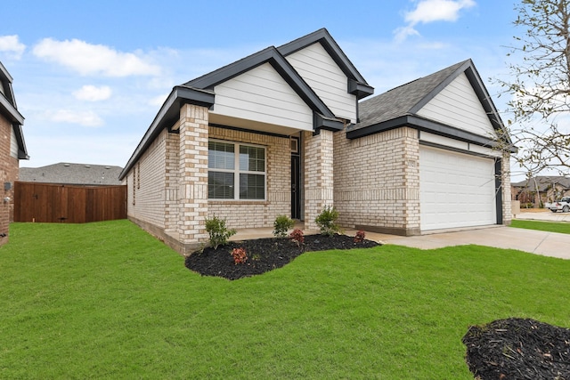 view of front of home with a garage and a front yard