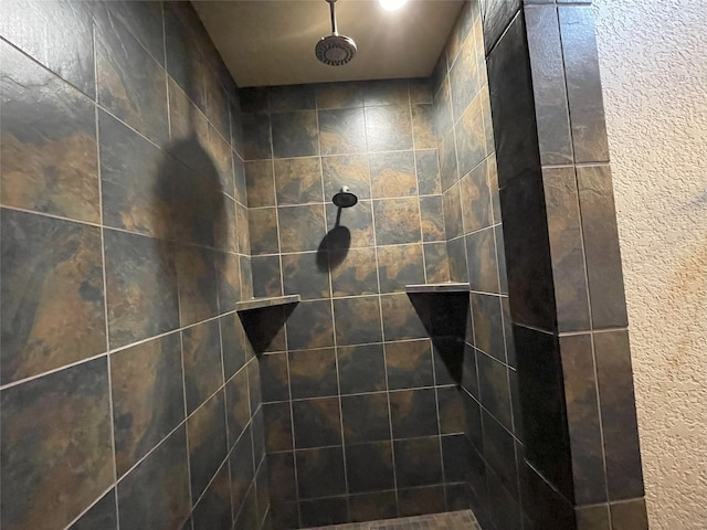 details with a tile shower