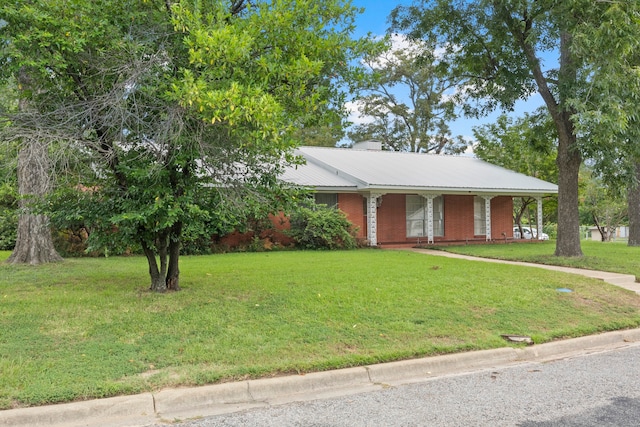 ranch-style house with a front yard