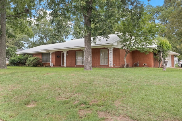 ranch-style home with a front lawn