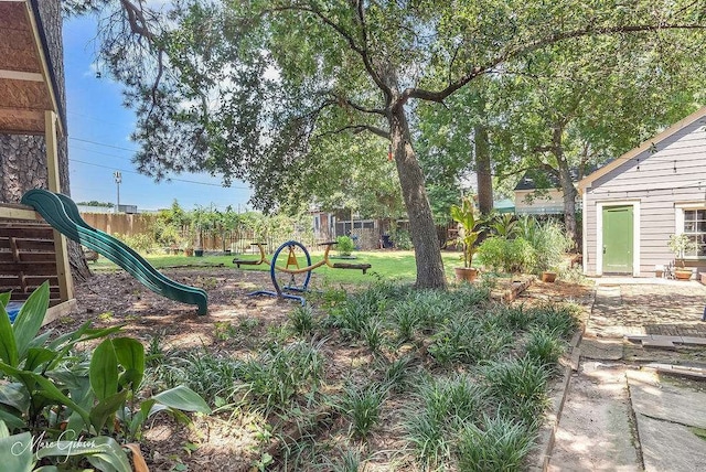 view of yard featuring a playground