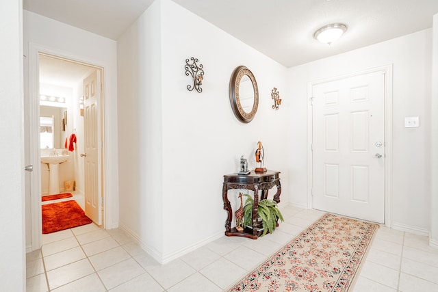 entrance foyer featuring light tile patterned floors