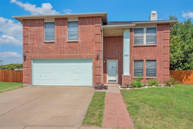 view of front facade with brick siding, a front lawn, fence, concrete driveway, and a garage