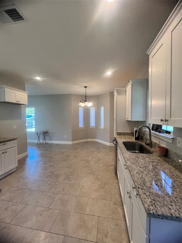 kitchen featuring sink, white cabinetry, and stainless steel appliances