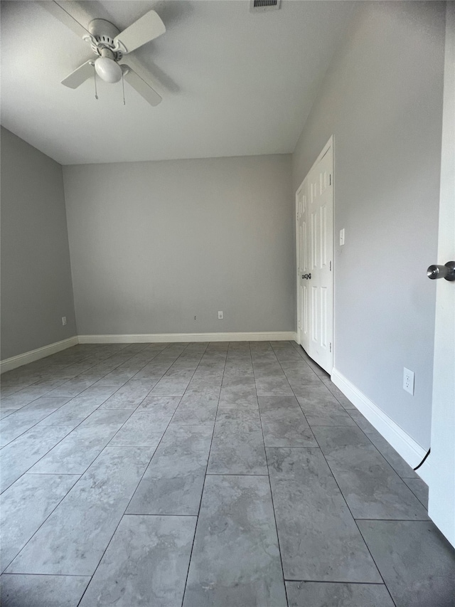 unfurnished room featuring ceiling fan