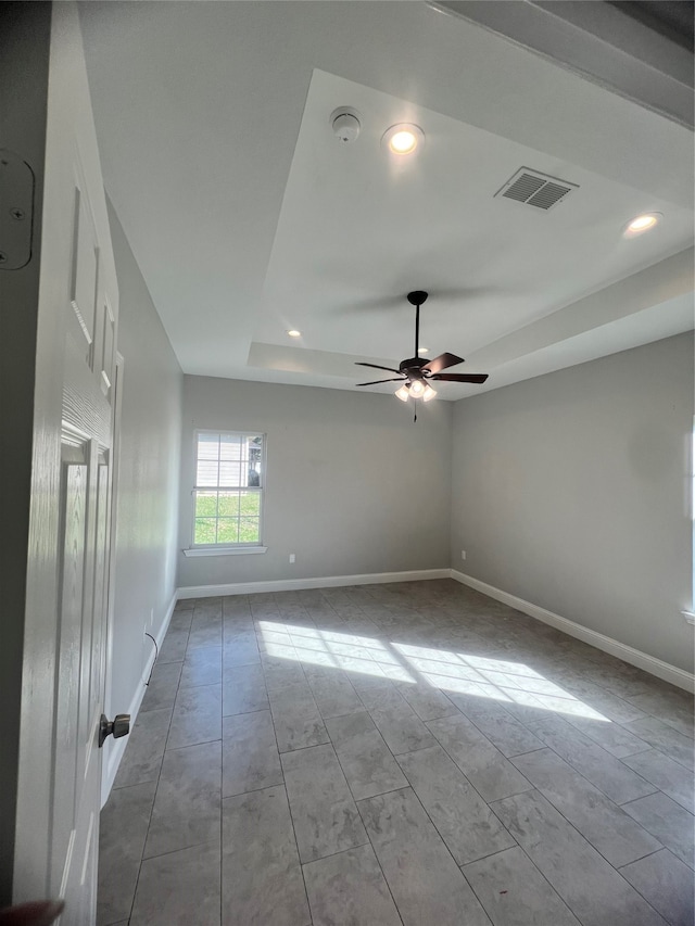 full bathroom featuring tile patterned floors, vanity, toilet, and tiled shower / bath