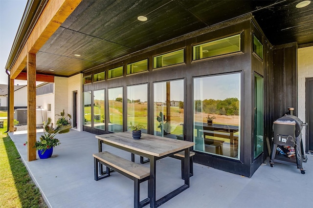 view of patio with a grill