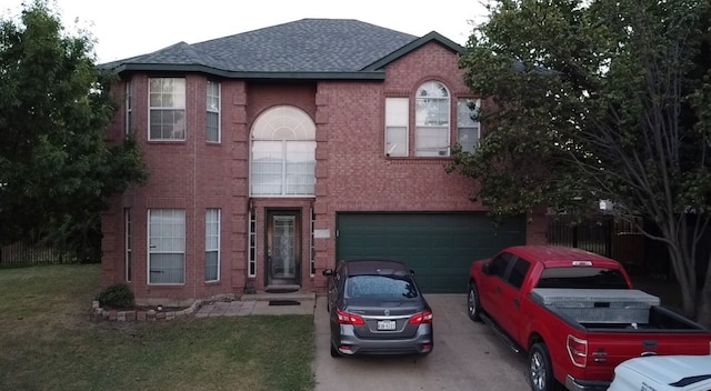 view of front of property featuring a garage