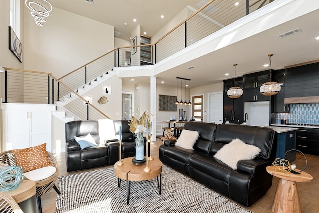 living room featuring a high ceiling