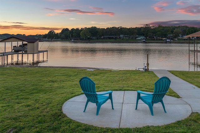 property view of water with a dock