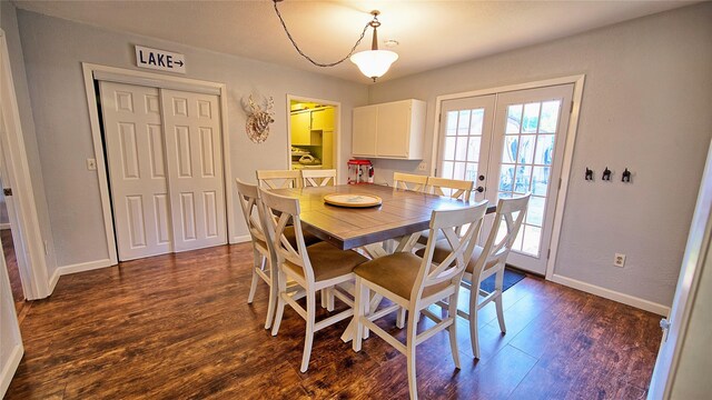 dining space featuring french doors and hardwood / wood-style floors