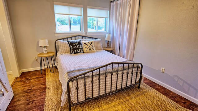 bedroom featuring hardwood / wood-style flooring