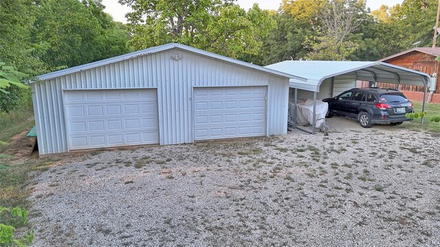 garage with a carport